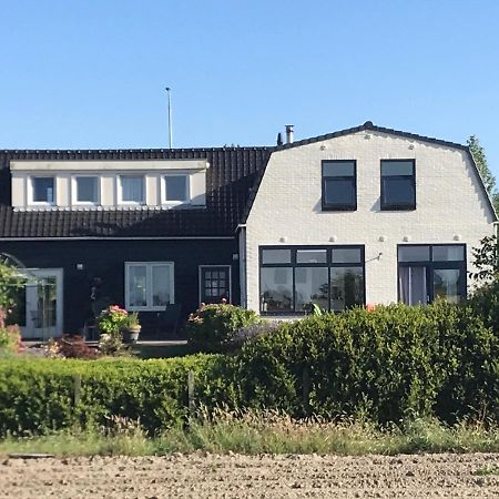 T Huuske Tuinappartement Met Fantastisch Uitzicht, Nabij Zee Zonnemaire Kültér fotó