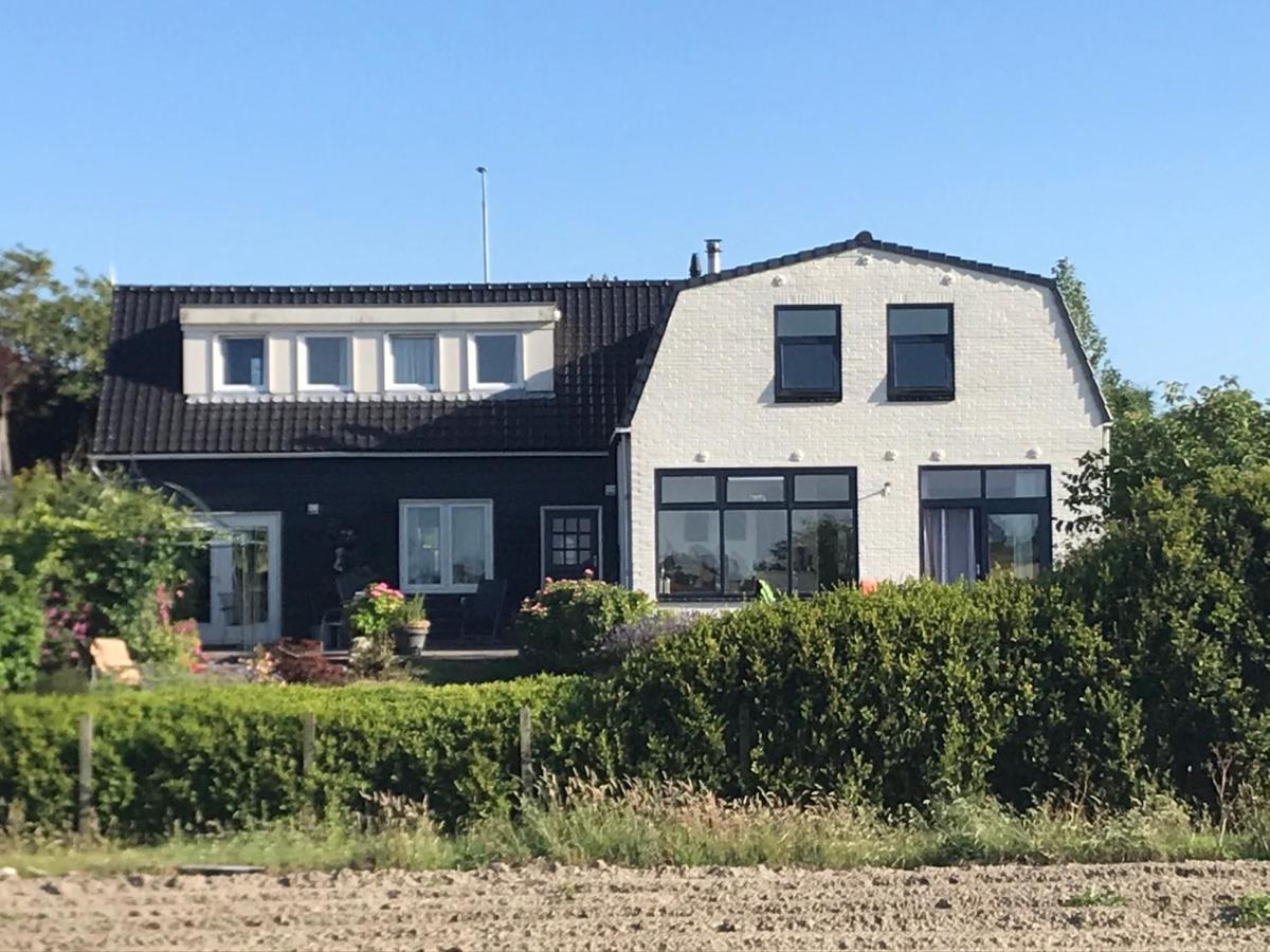 T Huuske Tuinappartement Met Fantastisch Uitzicht, Nabij Zee Zonnemaire Kültér fotó