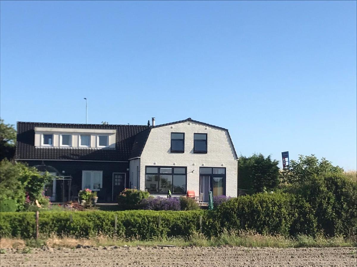 T Huuske Tuinappartement Met Fantastisch Uitzicht, Nabij Zee Zonnemaire Kültér fotó